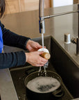 Solid Dish Soap in a white bowl by ardent goods